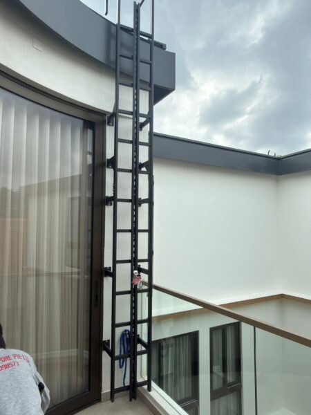 SS304 Vertical Ladder with Fall Arrest Rail Installed at Rooftop SS304 vertical access ladder with fall arrest rail for rooftop access Singapore