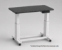 Electric height-adjustable laboratory bench with black chemical-resistant phenolic worktop, white frame and digital controller.